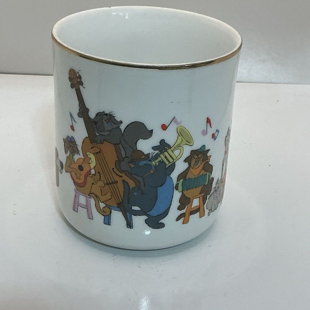 Walt Disney Productions The Aristocats Disney White Ceramic Mug Gold Rim.